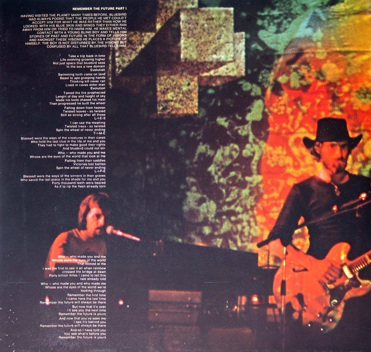 Left inside page of Nektar's 'Remember the Future' gatefold, featuring a live performance photo of the band. A singer-keyboardist is illuminated on the left, while a guitarist in a black hat stands on the right. Lyrics from 'Remember the Future Part I' overlay a cosmic-themed backdrop with swirling projections.