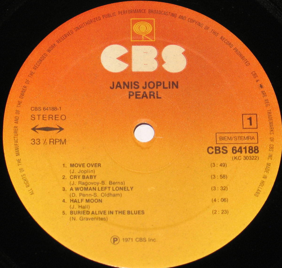 Close-up of the Janis Joplin - Pearl 12-inch Vinyl LP record label. The CBS label features a gradient orange-to-yellow background with bold white 'CBS' lettering at the top. The tracklist for Side 1 is displayed, including 'Move Over,' 'Cry Baby,' 'A Woman Left Lonely,' 'Half Moon,' and 'Buried Alive in the Blues.' The CBS catalog number 64188 is visible, along with the BIEM/STEMRA rights information and 'Made in Holland' production details.