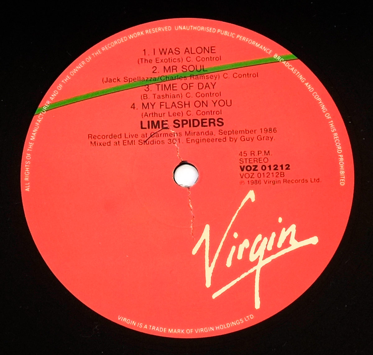 Side B label of Lime Spiders' 'Weirdo Libido' (1987) vinyl record. The label is bold red with black text, featuring the white Virgin Records logo. A thin green line slashes across the top. The tracklist includes 'I Was Alone,' 'Mr. Soul,' 'Time of Day,' and 'My Flash on You.' Recorded live at Carmens Miranda, Sydney, September 1986, and mixed at EMI Studios 301. Catalog number VOZ 01212B.