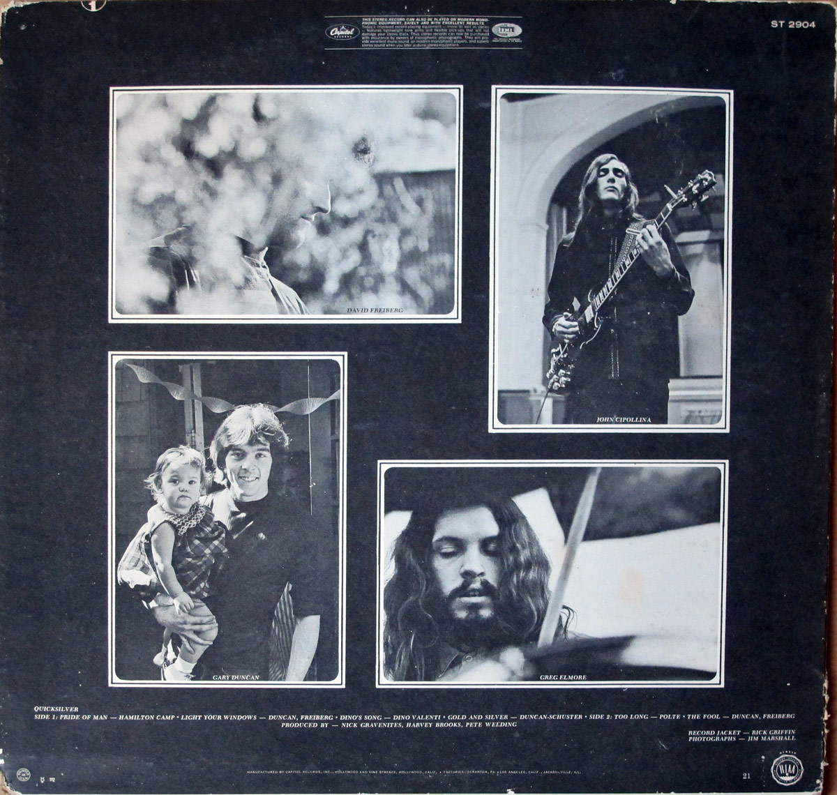 Back cover of Quicksilver Messenger Service's self-titled debut album. The dark background features four black-and-white photographs of the band members framed in white. The top-left photo showcases David Freiberg in a blurred, dreamy outdoor shot. The top-right features John Cipollina standing on a porch, playing an electric guitar. The bottom-left captures Gary Duncan smiling while holding a young child, adding a personal touch. The bottom-right presents Greg Elmore in a focused, intimate moment behind his drum kit. The bottom section lists track titles, production credits, and album details in a clean, minimalist font, reinforcing its 1960s psychedelic rock aesthetic. Capitol Records and stereo markings are visible at the top.