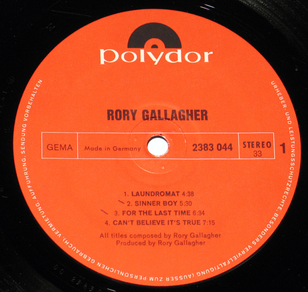 Polydor red record label for Rory Gallagher’s self-titled album, featuring the tracklist for Side 1 and production details, with the Polydor logo at the top.