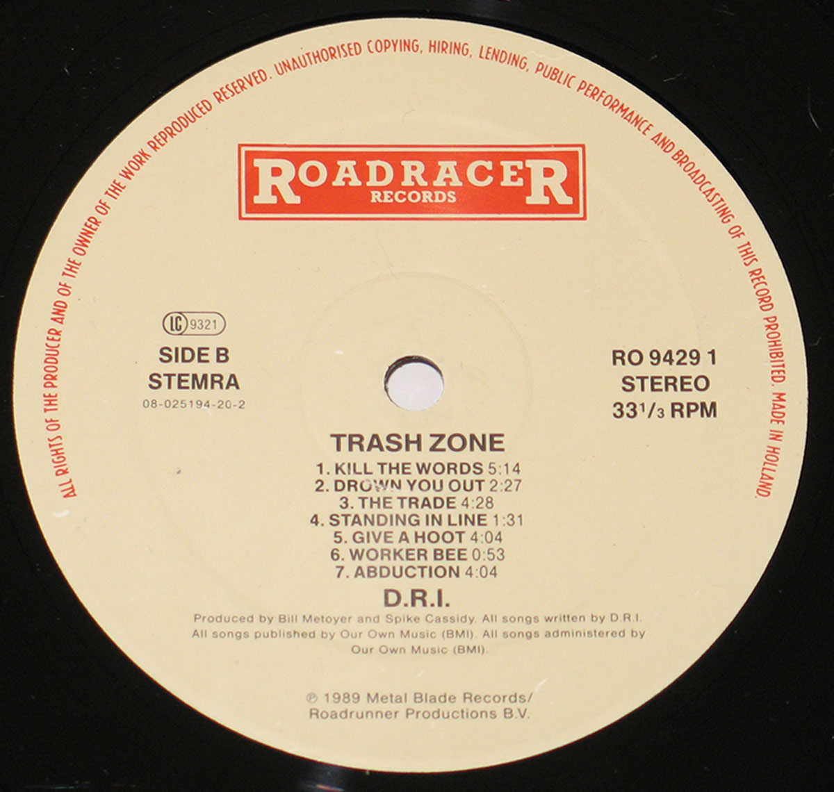 Side B vinyl label of DRI's 'Thrash Zone' album, featuring a beige background with black text, red Roadracer Records logo, tracklist, and production credits.