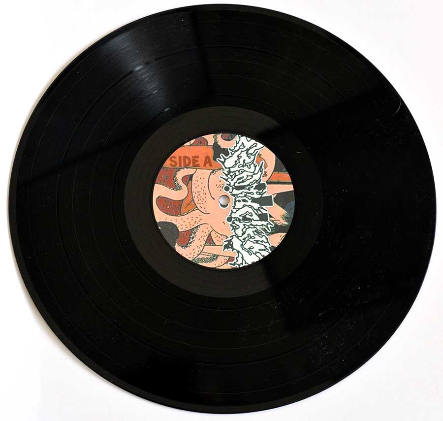 Photo of 12" LP Record Side One TENTACLES - Self-Titled (Switzerland)  Vinyl Record Gallery https://vinyl-records.nl//