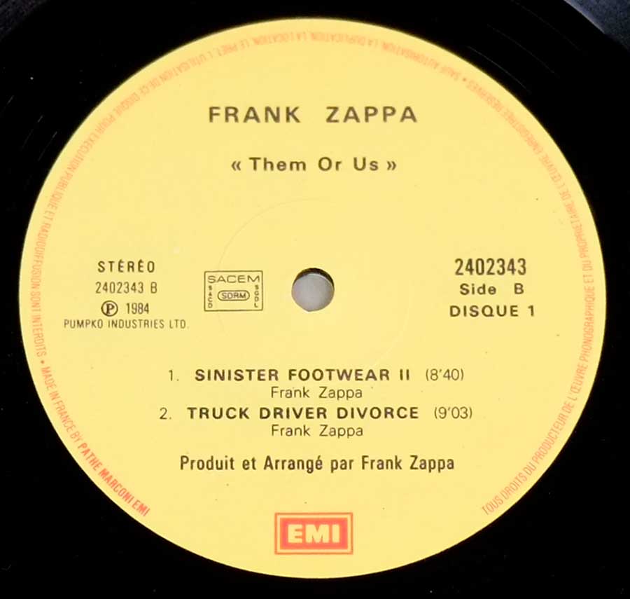 "Them or Us" Record Label Details: EMI 2402343 ℗ 1984 Pumpko Industries Ltd Sound Copyright 