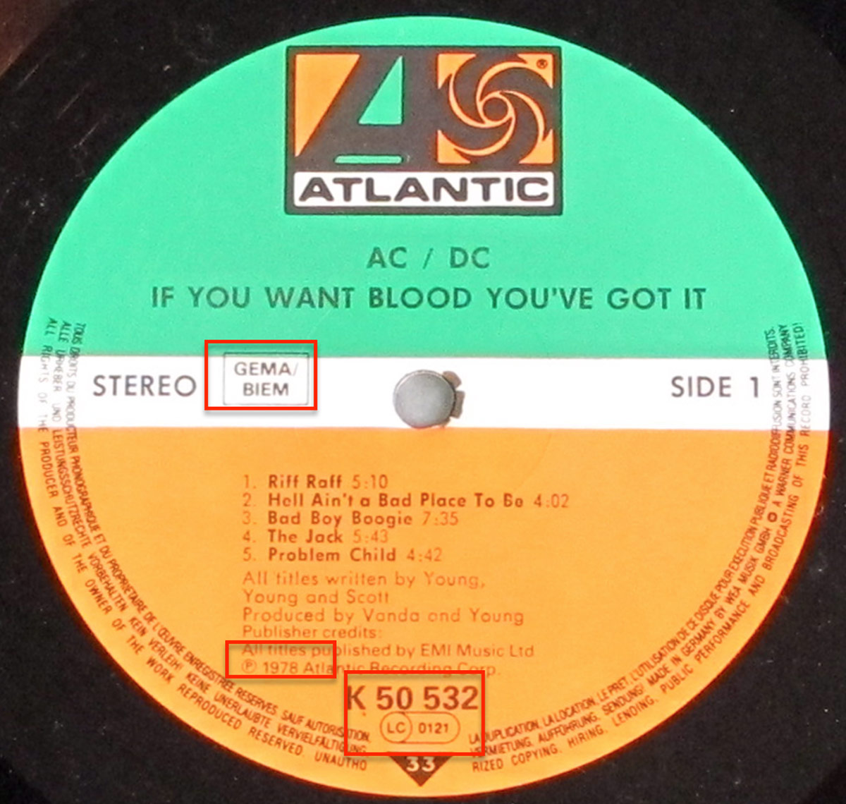 Atlantic Records label for AC/DC’s If You Want Blood You’ve Got It, featuring a green, orange, and white design with GEMA/BIEM licensing, catalog number K 50 532, stereo, and 33 RPM specifications, and production credits to Vanda and Young.