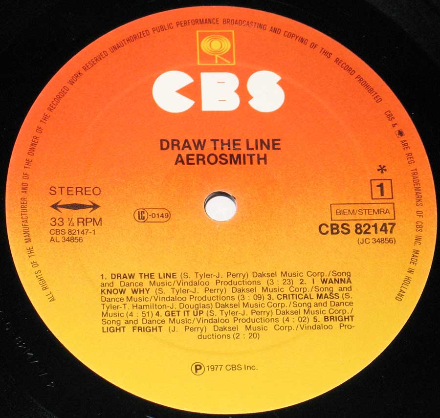 Close up of record's label AEROSMITH - Draw The Line 12" Vinyl LP Album Side One