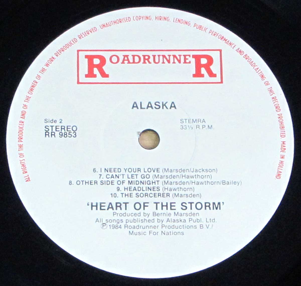 Close-up of Side Two label from the 1984 Holland pressing of Alaska's Heart of the Storm LP, showing Roadrunner Records logo, tracklist, credits, and catalog number RR 9853.