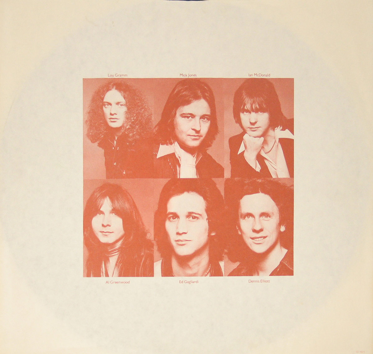 Six red-tinted portrait photos of Foreigner band members on the original custom inner sleeve, with names: Lou Gramm, Mick Jones, Ian McDonald, Al Greenwood, Ed Gagliardi, and Dennis Elliott.