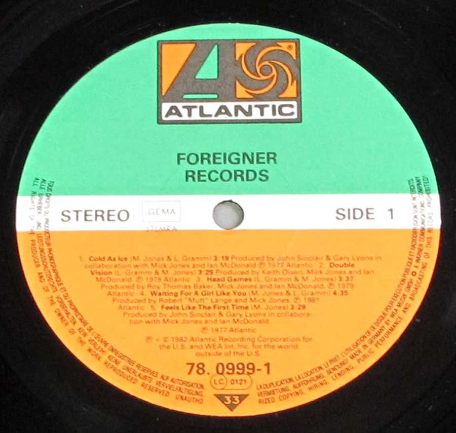 Close up of Side One record's label "RECORDS by Foreigner" Green, White and Orange Colour ATLANTIC Record Label Details: Atlantic 78.0999 