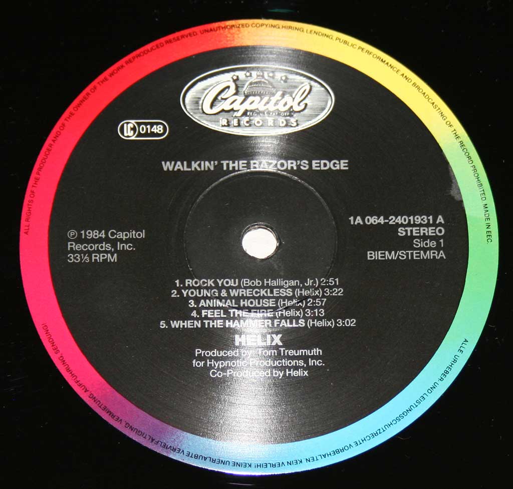 Close-up Photo of "HELIX Walkin' The Razor's Blade" "Capitol Records" Multi-colour Record Label  