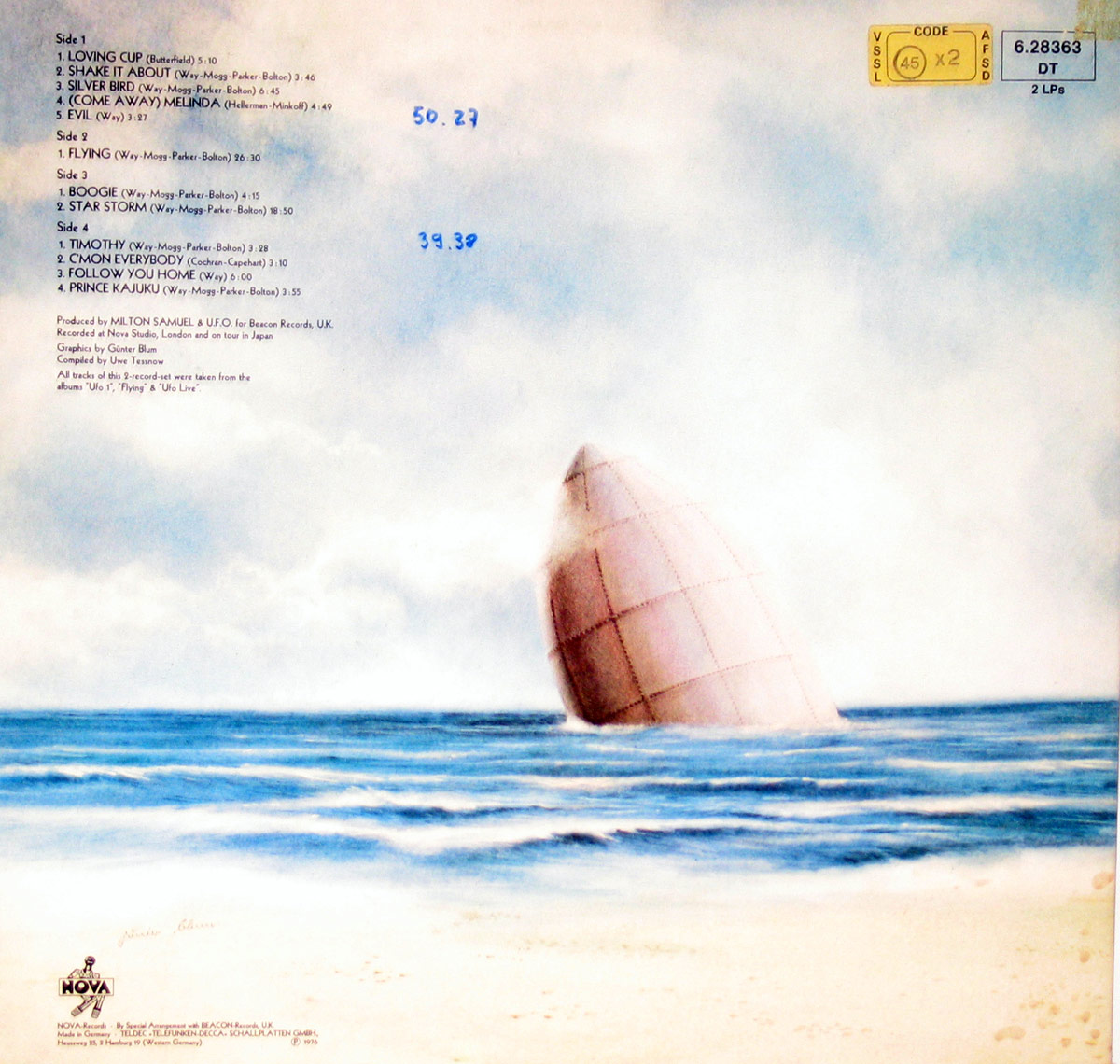 The back cover of UFO's 'Space Metal' album features a vast ocean and sandy shore, with a massive metallic, capsule-like object partially submerged in the water. The soft blue sky blends into the misty horizon, creating a dreamlike atmosphere. The tracklist is positioned in the upper-left corner, and a yellow sticker with catalog details is visible in the upper-right.