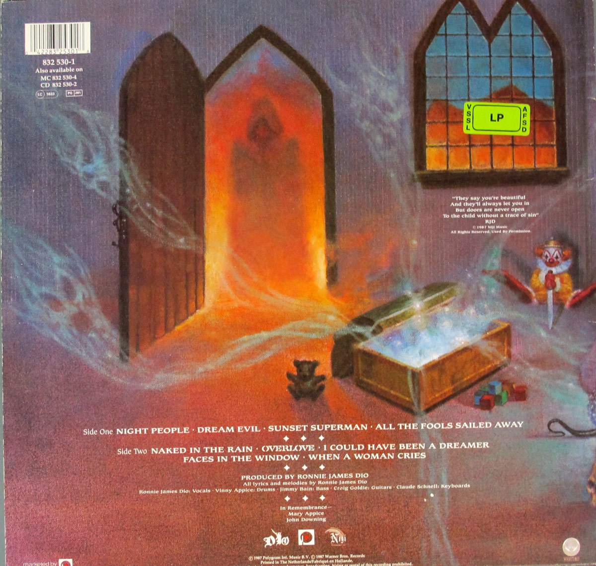 A dark and atmospheric back cover of DIO Dream Evil featuring an open gothic doorway glowing with eerie orange light, mist swirling around the entrance. A shadowy figure looms beyond the doorway. A glowing chest, a small teddy bear, and a sinister clown doll sit on the floor. Gothic arched windows cast an ominous glow, with lyrics printed in the scene.