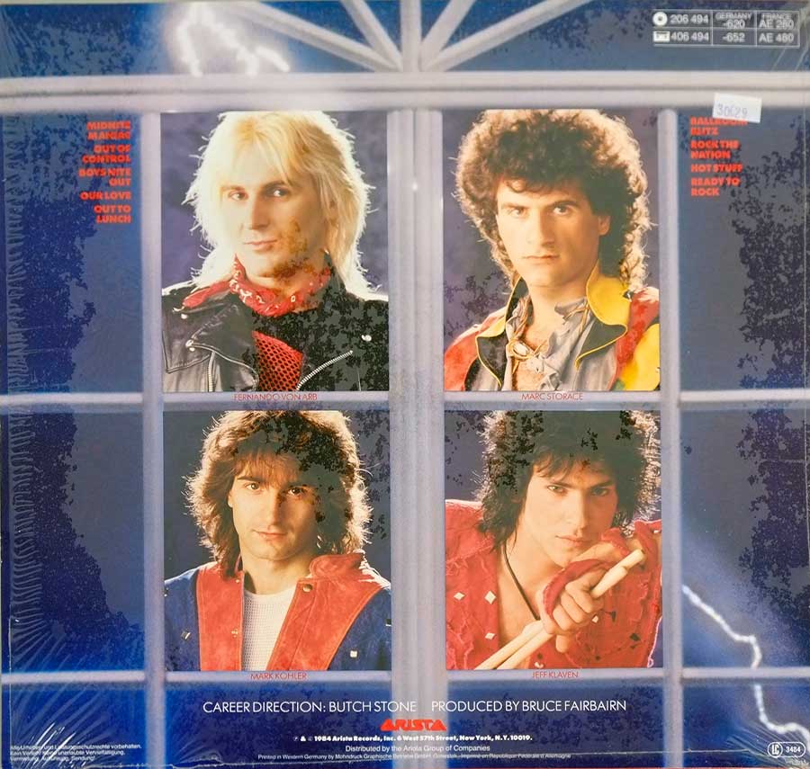 Four portrait photos of the KROKUS band members on the album back cover 