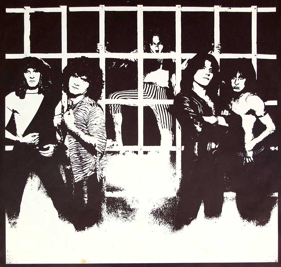 Full page black and white photo of the KROKUS band 