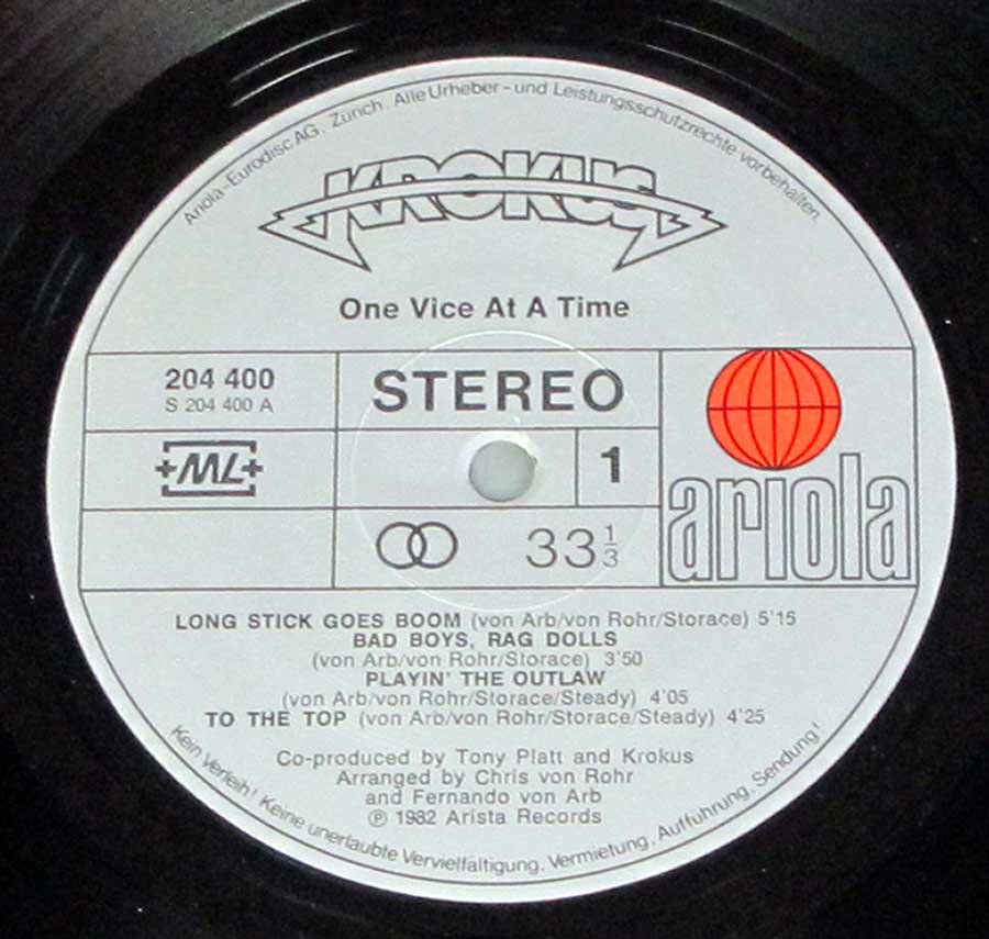 "One Vice At A Time Swiss Release" Grey Colour ARIOLA Record Label Details: Ariola 204 400 +ML+ ℗ 1982 Arista Records Sound Copyright 