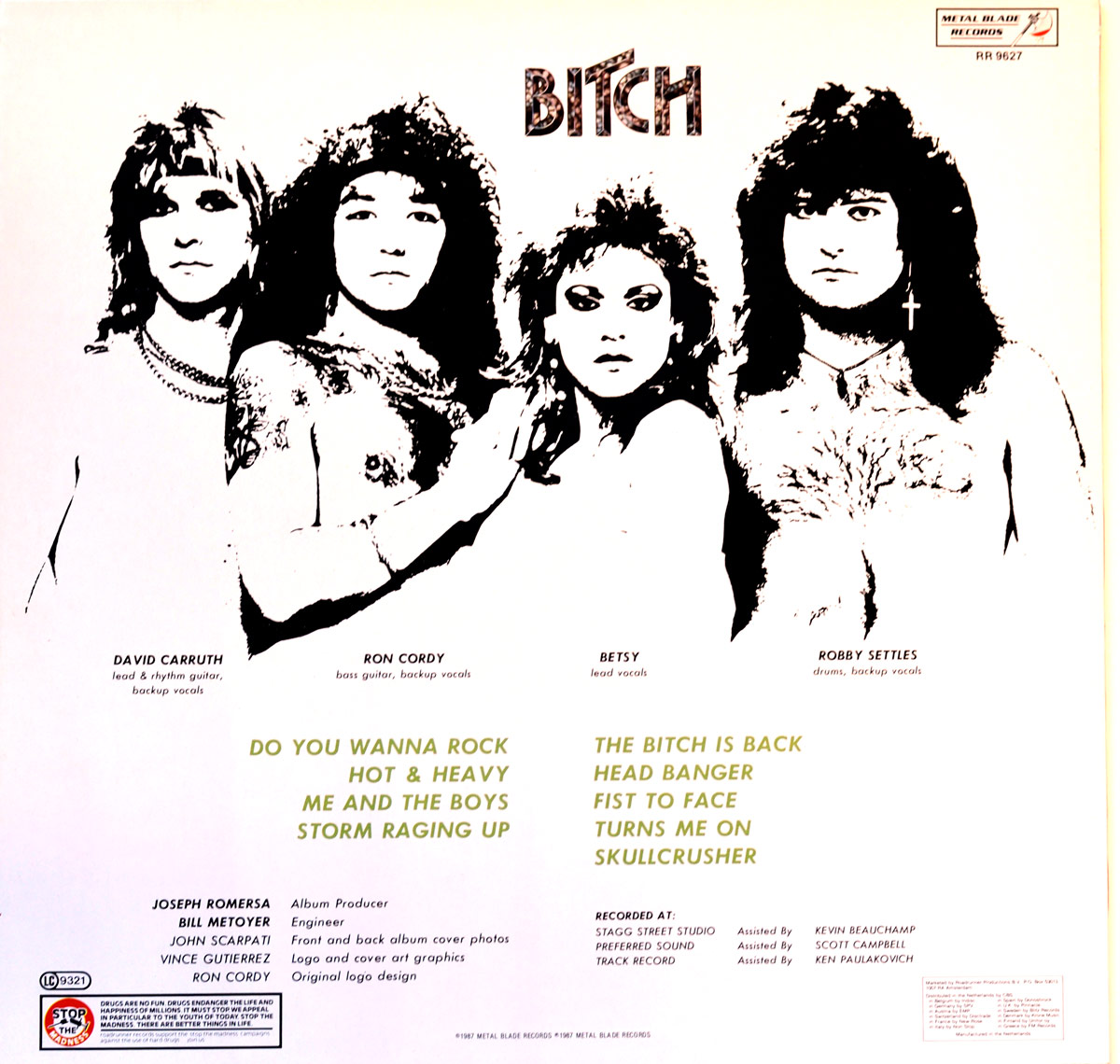 Back cover of 'The Bitch is Back' by Bitch (1987). Features a high-contrast black-and-white band photo of the four members: David Carruth (guitar), Ron Cordy (bass), Betsy Weiss (vocals), and Robby Settles (drums). Each member's name and role are printed beneath their image. The tracklist is divided into two sections, printed in green text. Production credits, recording studios, and Metal Blade Records branding appear at the bottom, along with a 'STOP THE MADNESS' anti-drug message.