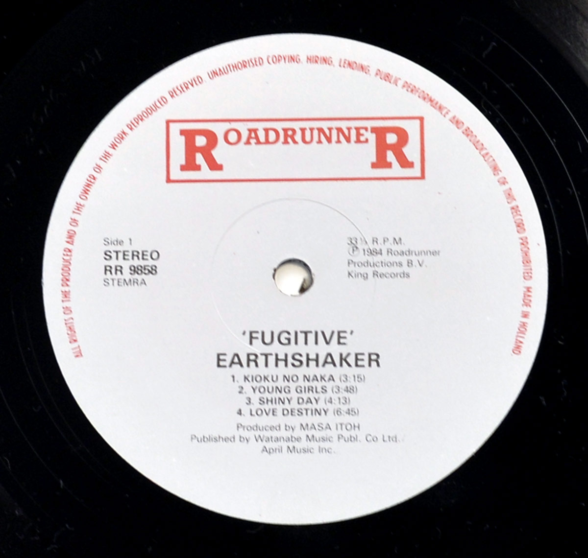 Photo of "EARTHSHAKER Fugitive" 12" LP Record - Side One:

