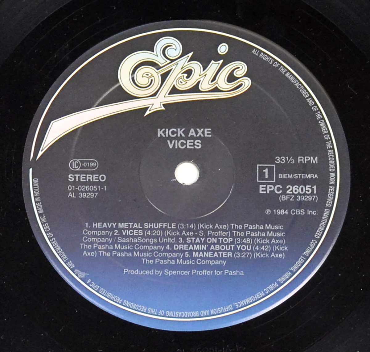 KICK AXE - Vices Side One Epic label with silver text on dark background listing five tracks and credits, including Spencer Proffer as producer, 1984 CBS Holland pressing.