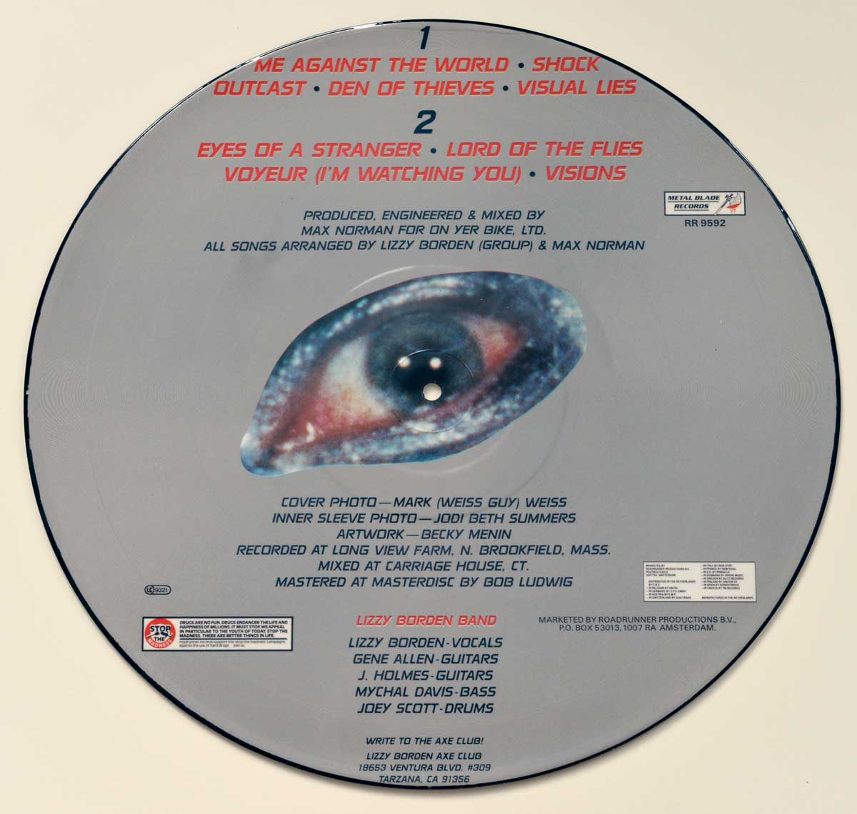 The back side of Lizzy Borden's 'Visual Lies' Picture Disc LP, featuring a large surrealistic eye in the center with a cloudy, dreamlike texture. The tracklist is displayed in bold red and black text at the top, with Side 1 including 'Me Against The World,' 'Shock,' 'Outcast,' 'Den Of Thieves,' and 'Visual Lies,' while Side 2 lists 'Eyes Of A Stranger,' 'Lord Of The Flies,' 'Voyeur (I'm Watching You),' and 'Visions.' Below the eye, production credits name Max Norman as producer, engineer, and mixer, along with the recording location at Long View Farm Studios and mastering at Masterdisk by Bob Ludwig. The Lizzy Borden band members—Lizzy Borden, Gene Allen, J. Holmes, Mychal Davis, and Joey Scott—are credited in red text. Additional credits for cover photography by Mark Weiss and artwork by Becky Menin are also present. The Metal Blade Records and Roadrunner Records logos appear on the right, with a small copyright and anti-piracy warning near the bottom.
