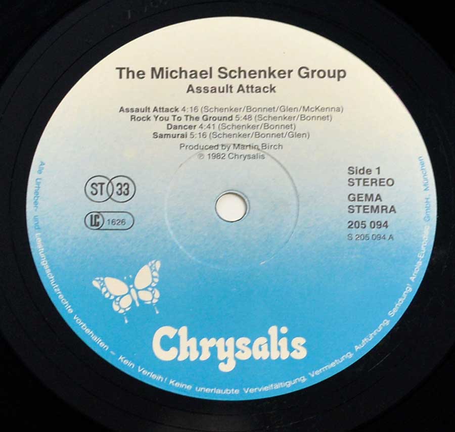 "Assault Attack" White To Blue Colour with white butterfly logo CHRYSALIS Record Label Details: CHRYSALIS 205 094 ℗ 1982 Sound Copyright 