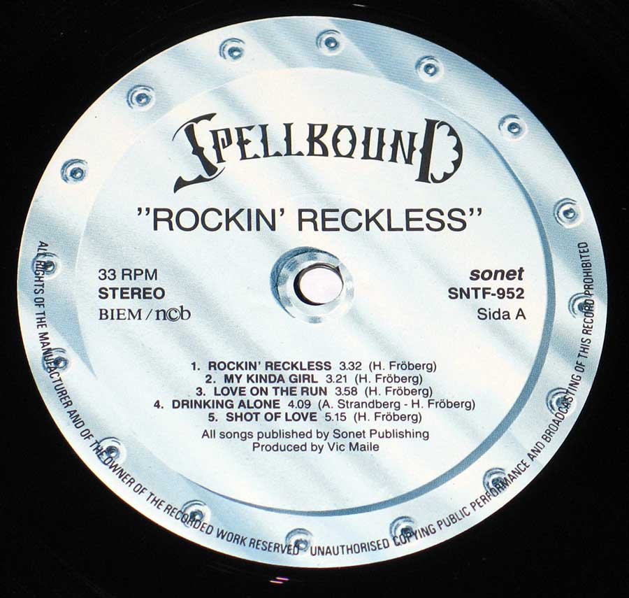 Close-up of the Spellbound Rockin' Reckless vinyl record label, showing track list for Side A and credits SONET SNTF-952 