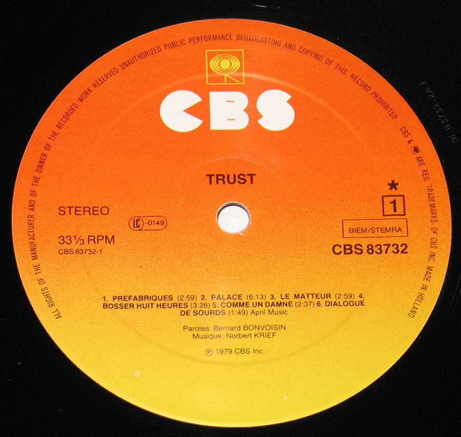 Close-up Photo of "Trust L'Elite S/T Self-titled" Record Label  