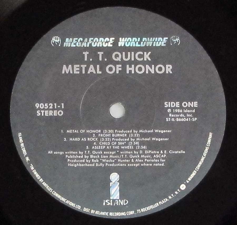 "Metal Of Honor" Record Label Details: Black Colour Label Megaforce Worldwide 90521-1 , ST-IL-866031-SP ℗ 1986 Island Records, Inc Sound Copyright 