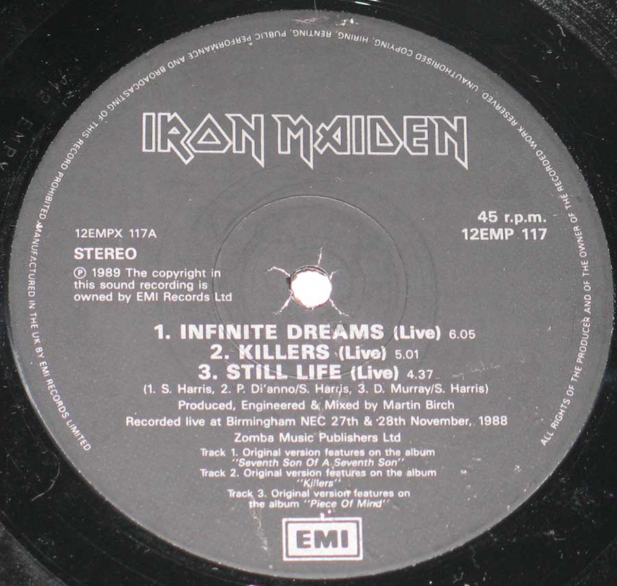 Close up of record's label IRON MAIDEN Infinite Dreams Autographed Disc Poster Bag Side One