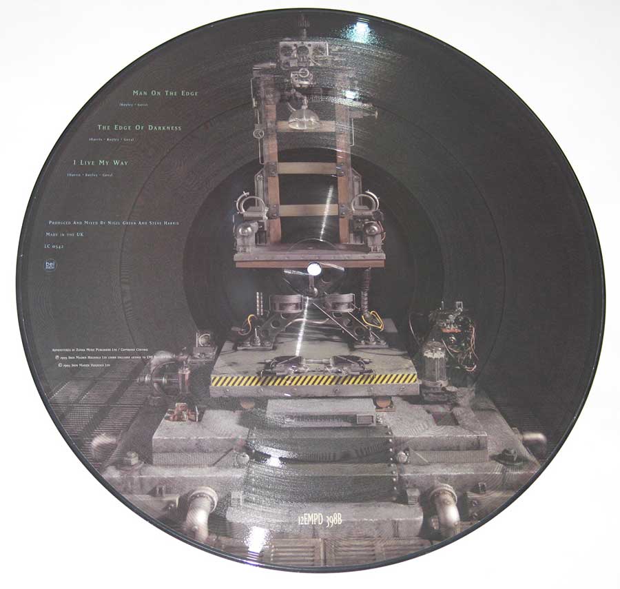Photo of Side Two of IRON MAIDEN - Man on the Edge 12" Picture Disc + Huge Poster  