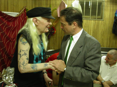 Photo of Johnny Winter greeted by Hungarian Ambassador 