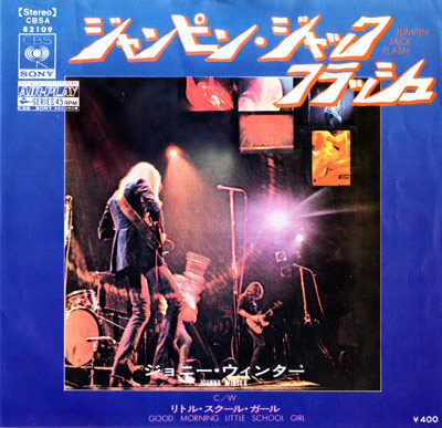 Album cover for Johnny Winter's 'Jumpin' Jack Flash,' featuring a live performance photo with Japanese text, a blue background, and CBS Sony branding.