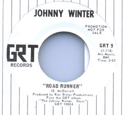 Johnny Winter promotional single for 'Road Runner' on GRT Records. Produced by Ken Ritter Productions, from the GRT album 'The Johnny Winter Story' (GRT 10004). Song written by E. McDaniell. Label includes text 'Promotion Not for Sale,' catalog number GRT 9, Arc Music BMI, and a runtime of 2 minutes and 2 seconds.