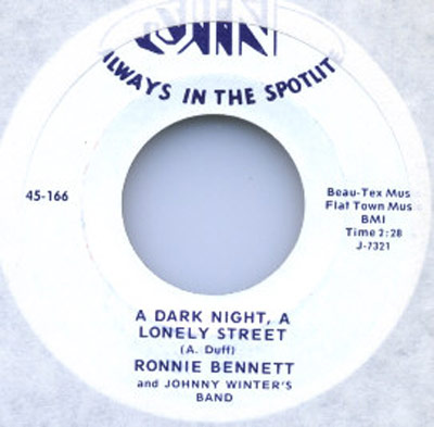 White-label record of Ronnie Bennett's single 'A Dark Night, A Lonely Street' with Johnny Winter's band, catalog number 45-166, duration 2:28, written by A. Duff, published by Beau-Tex Music and Flat Town Music, released on Jin Records.
