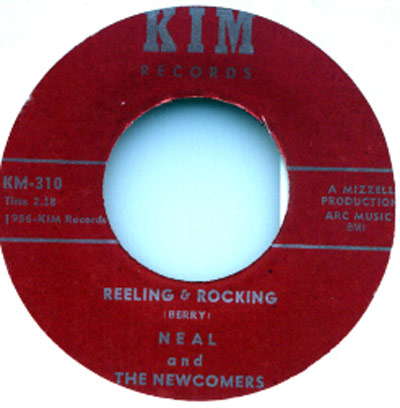 Red label of KIM Records, featuring the 1956 release of 'Reeling & Rocking' by Neal and the Newcomers.