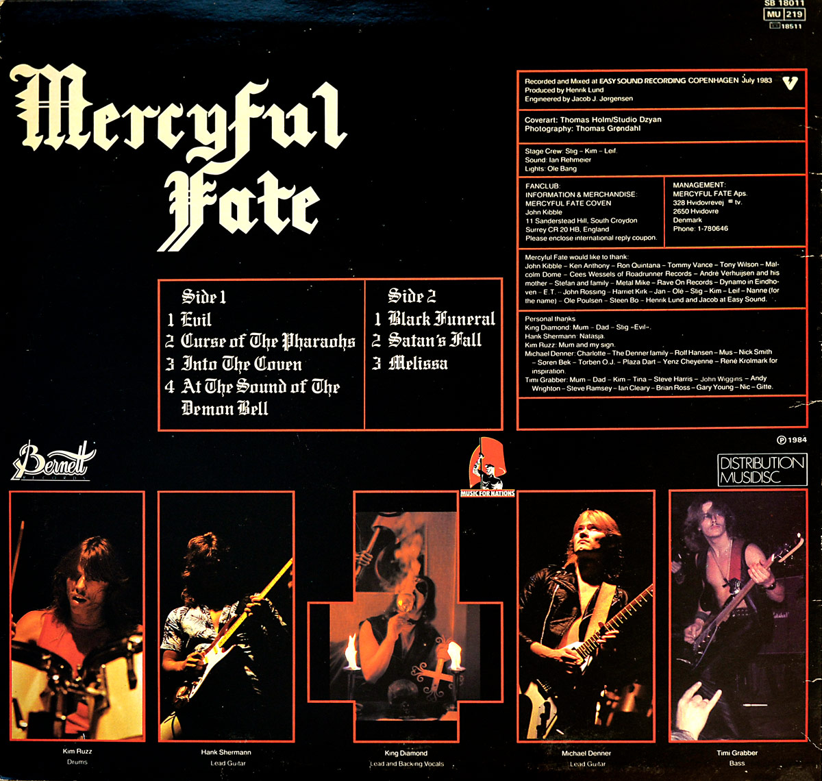 Back cover of Mercyful Fate’s 1983 album “Melissa.” The design features a black background with the band’s name in large, gothic white lettering at the top. Below, the tracklist is divided into two sections, “Side 1” and “Side 2,” framed in red borders. The bottom of the cover displays five individual band member photos, each outlined in red: Kim Ruzz (drums), Hank Shermann (lead guitar), King Diamond (vocals), Michael Denner (lead guitar), and Timi Grabber (bass). Additional text includes album credits, recording details, and special thanks, with the “Music for Nations” logo featuring a red-hooded executioner on the right. The overall aesthetic is dark and ominous, reflecting the album’s occult and heavy metal themes.