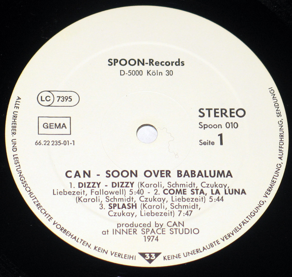 White label of CAN's Soon Over Babaluma LP, Side 1, showing SPOON Records logo, catalog number Spoon 010, LC 7395, GEMA rights box, 33 RPM symbol, and Side 1 track listing.