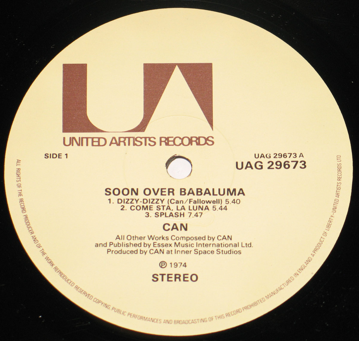 CAN - Soon Over Babaluma 1974 vinyl LP record label Side 1, United Artists Records UAG 29673. Displays band name, track titles, catalog number, and production credits in black text on a cream background.