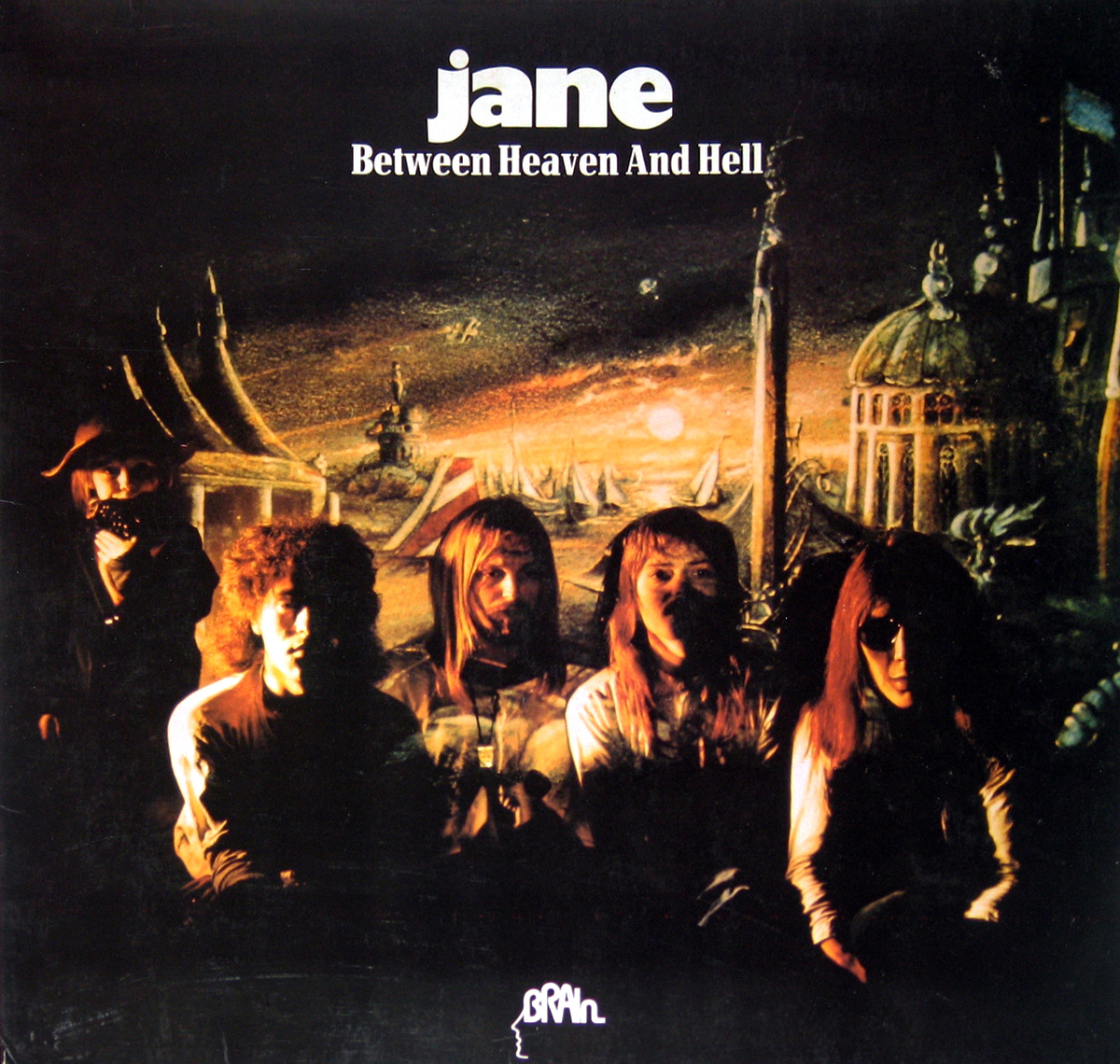 The album cover for JANE's Between Heaven and Hell is a psychedelic masterpiece. It features a surreal landscape with floating islands, strange creatures, and fiery skies. The band members are depicted as gods or angels, standing on top of one of the islands.