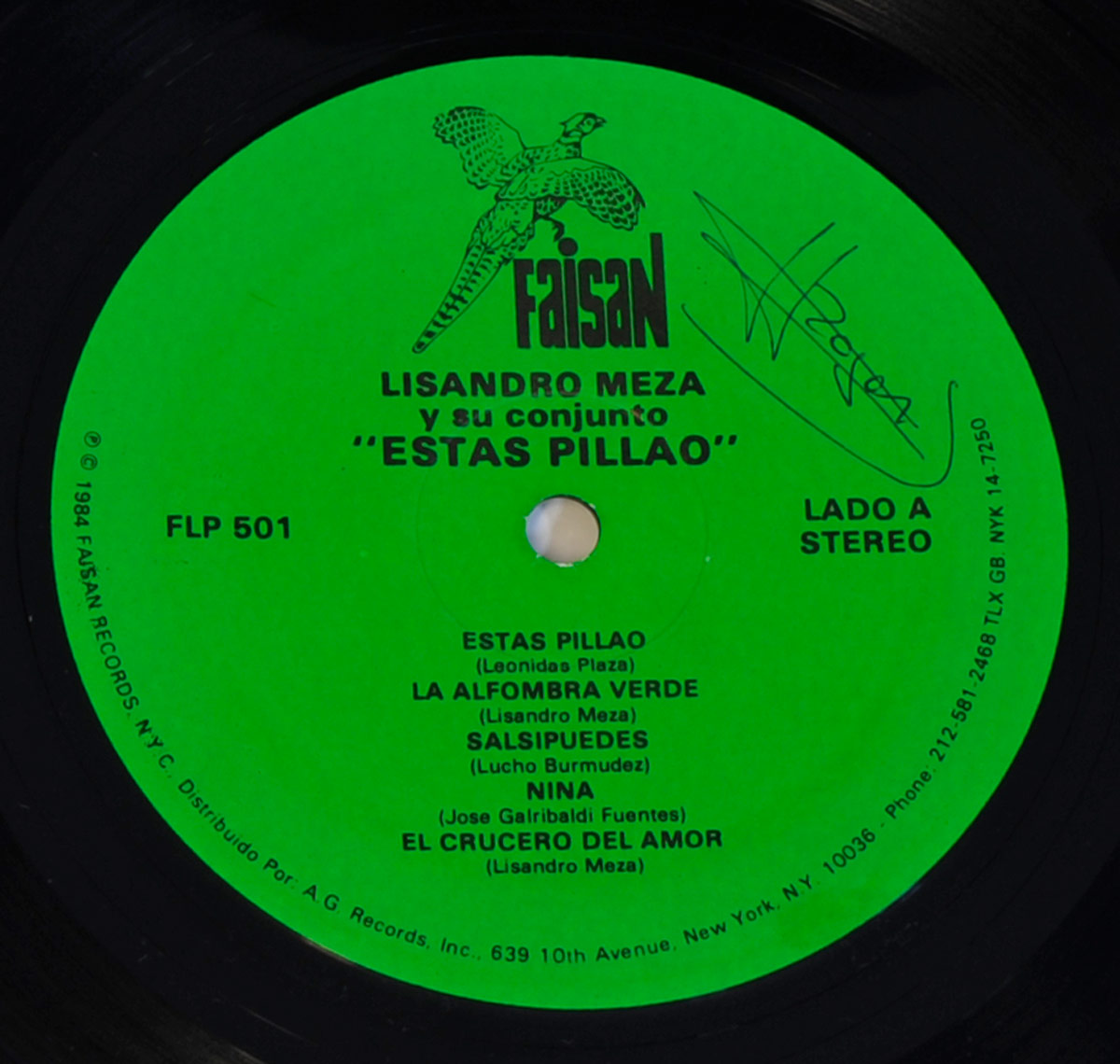Close-up of Side A label of 'Estás Pillao' by Lisandro Meza. The label is a bright green circle with black text and a black border from the vinyl record. At the top, the Faisan Records logo features an illustrated bird. Below, the artist's name, 'Lisandro Meza y su Conjunto,' and the album title appear in bold uppercase letters. The catalog number FLP 501 is printed on the left. The tracklist includes five songs, each with the songwriter’s name in parentheses. 'Lado A' and 'Stereo' are marked on the right side. A signature is visible on the upper right. The outer rim contains distribution details for A.G. Records Inc., New York.