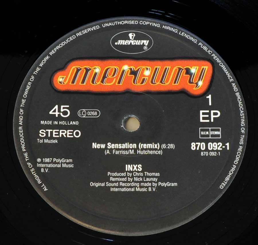 Close up of record's label INXS New Sensation 12" MAXI VINYL Side One