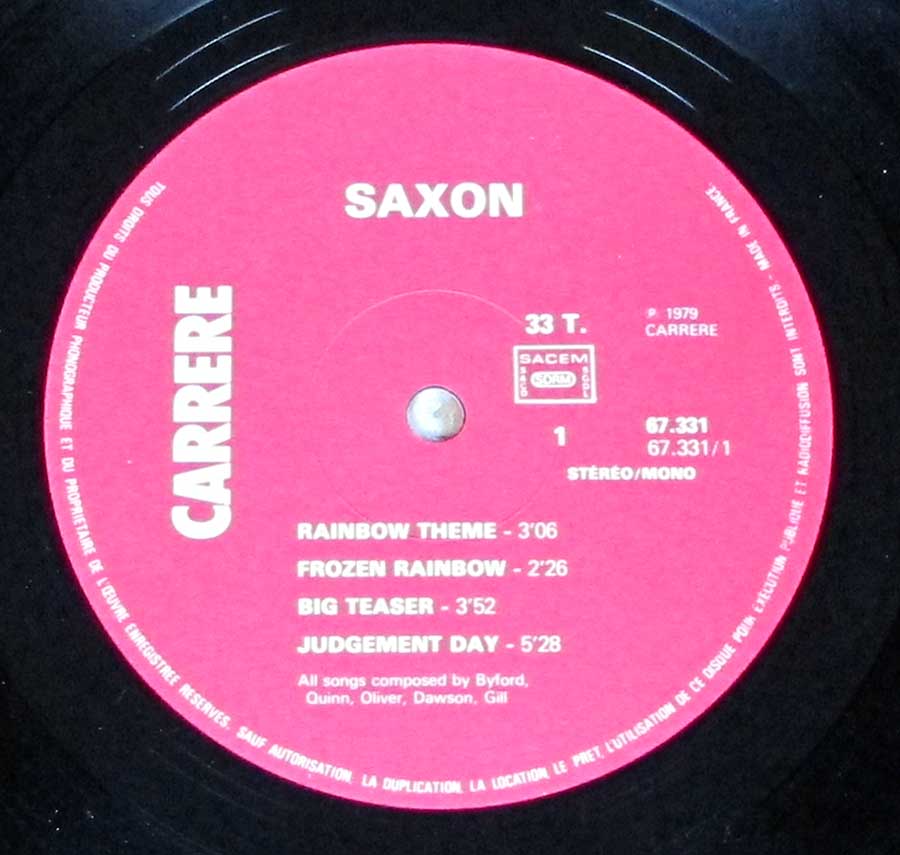 "Saxon" Pink Colour CARRERE Record Label Details: Carrere 67.331 ℗ 1979 Carrere Sound Copyright 