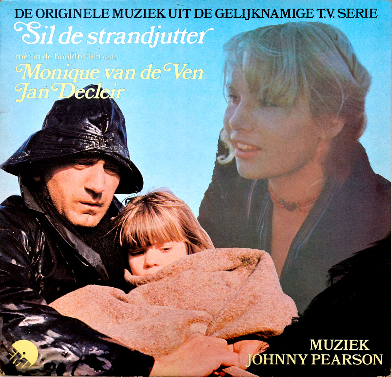 Album cover for JOHNNY PEARSON's 'Sil De Strandjutter' OST featuring a rugged man in a black raincoat holding a wrapped child, with a large faded portrait of Monique van de Ven smiling in the background, and title text in Dutch in white and yellow.