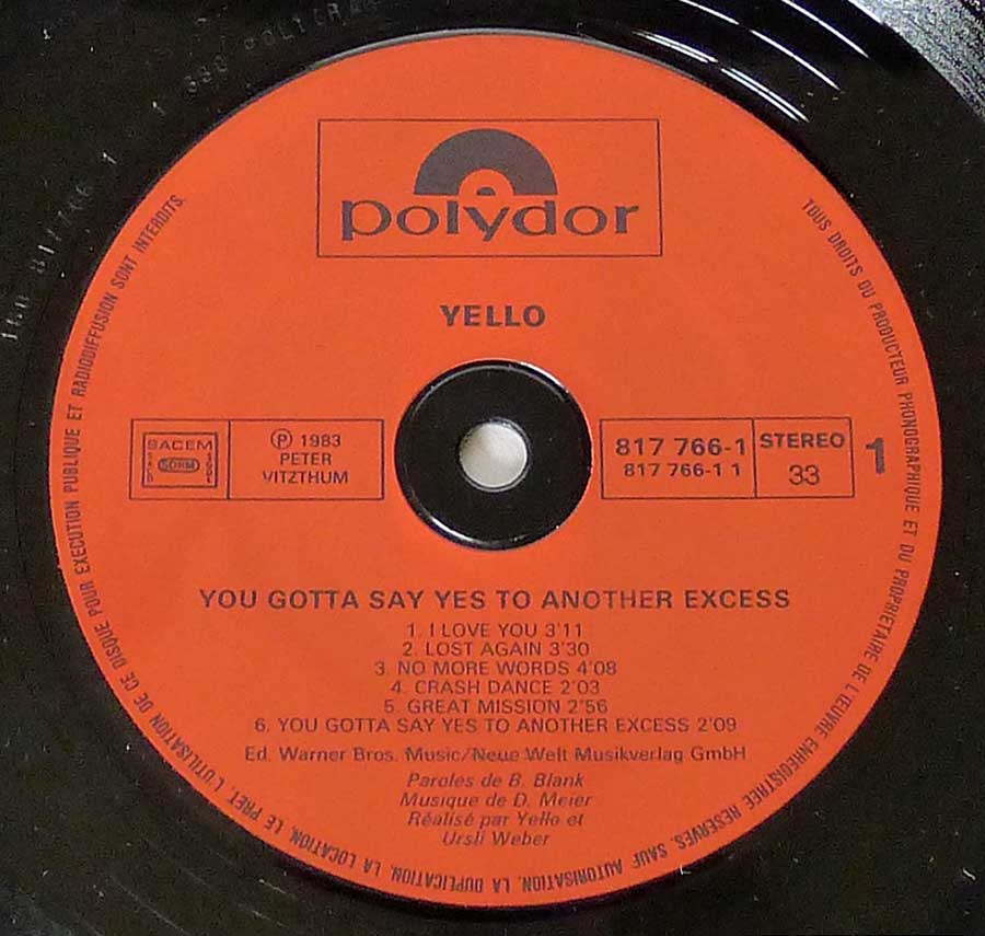 Close up of record's label YELLO - You Gotta Say Yes To Another Excess 12" LP Vinyl Album Side One