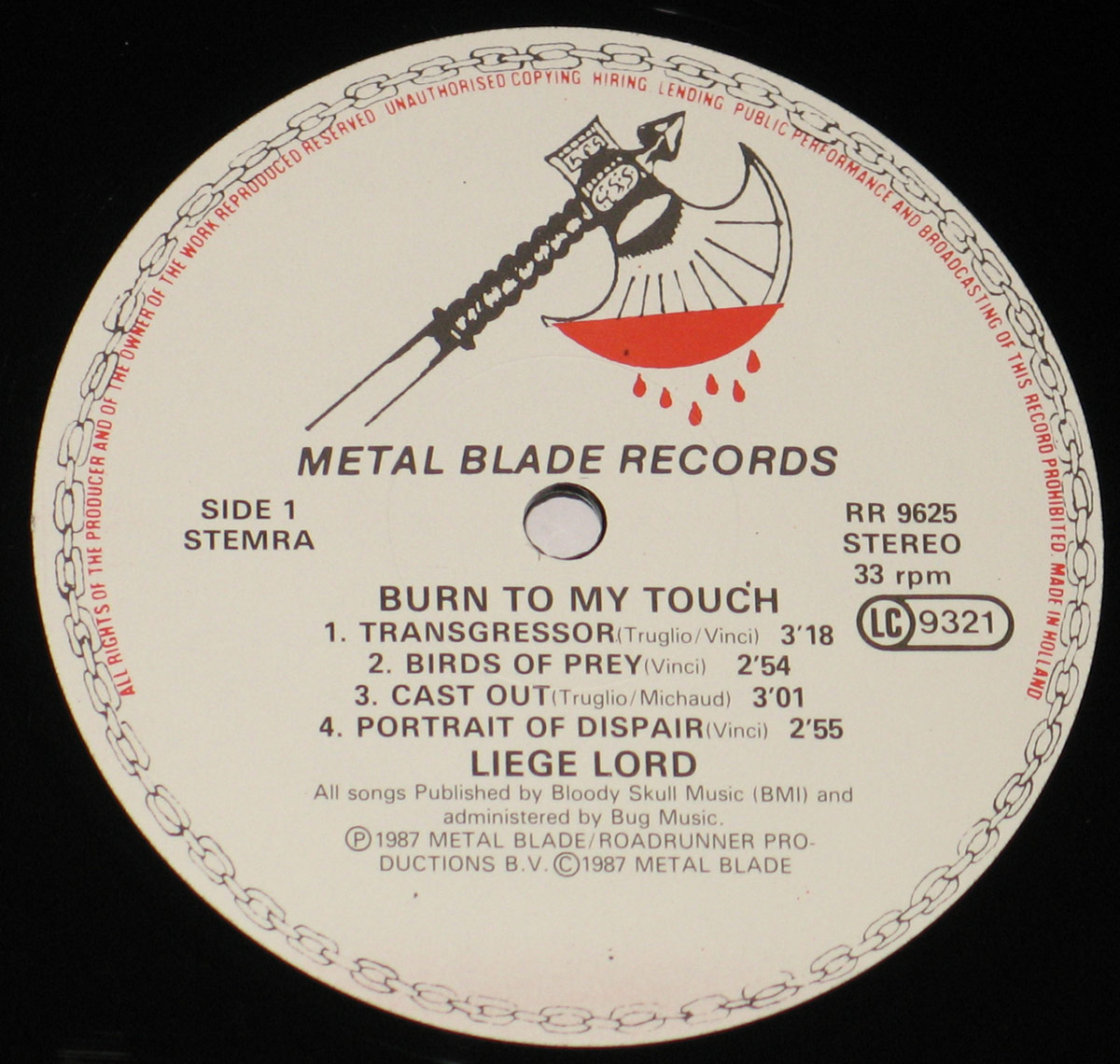 Close-up of Side One record label from Liege Lord's 'Burn to My Touch' (1987). Features the iconic Metal Blade Records Bloody Axe logo with a medieval axe dripping blood. Displays tracklist for Side One, including 'Transgressor,' 'Birds of Prey,' 'Cast Out,' and 'Portrait of Despair.' Includes catalog number RR 9625, STEMRA rights code, and publishing details.
