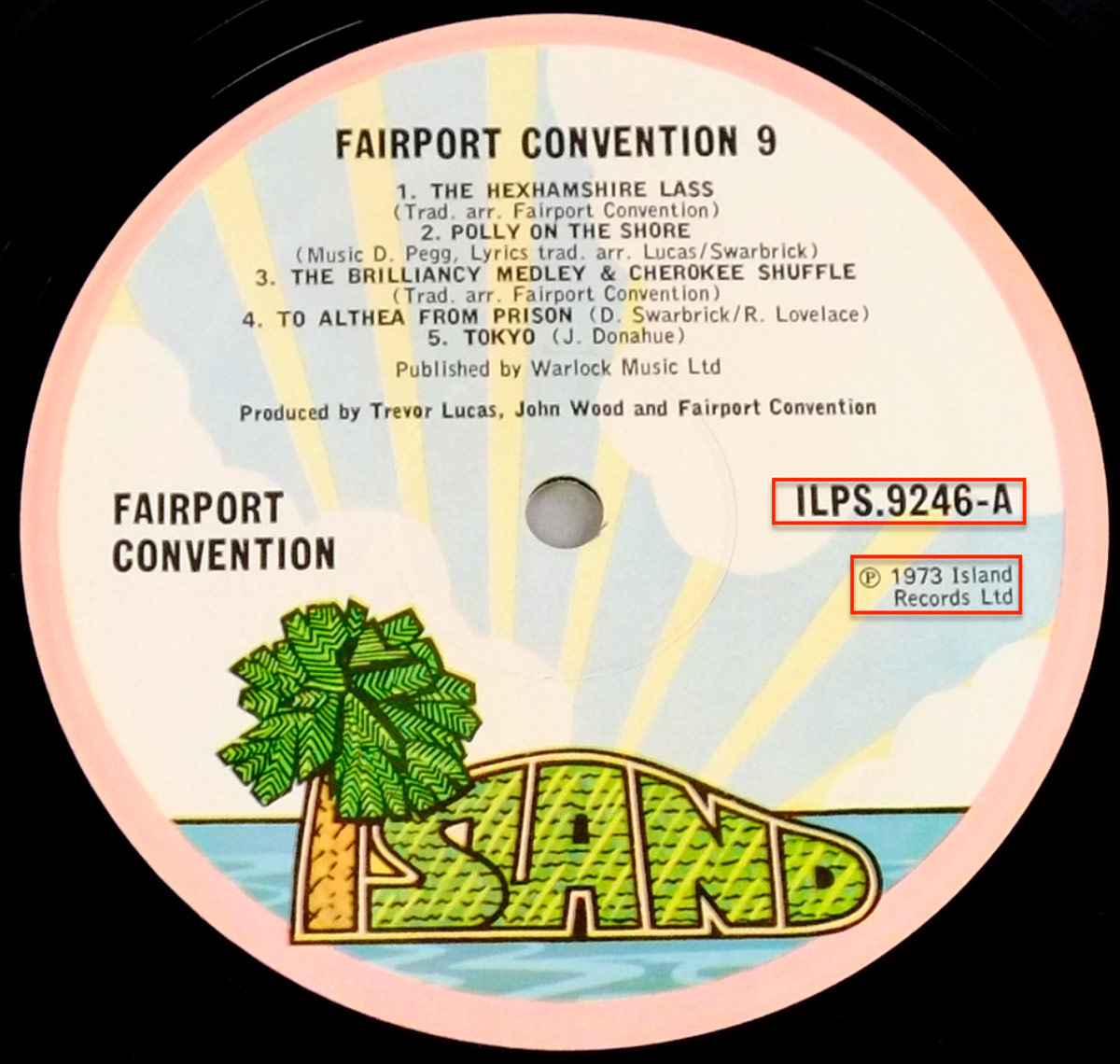 Close-up of Side One record label for Fairport Convention’s 1973 album 'Nine' on Island Records, showing track listing and production credits printed over a stylized sunrise with a green palm tree and 'ISLAND' logo.