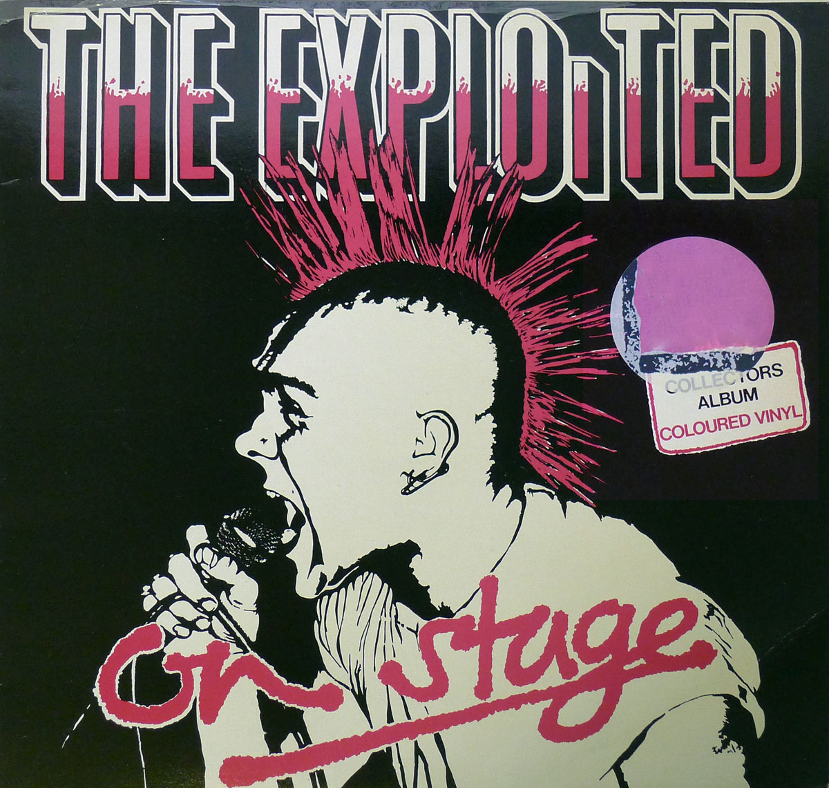The  cover of the album <em>On Stage</em> by the punk band <em>The Exploited</em>. It features a bold, minimalist illustration of a man with a distinctive Mohawk hairstyle in shades of pink and black, yelling into a microphone. The band's name, THE EXPLOITED, is written at the top in large, uppercase letters with a dripping paint effect, adding a gritty feel. Below the illustration, the album title, <em>On Stage</em>, appears in handwritten, brushstroke-style pink lettering. A purple circular sticker on the cover indicates it is a Collector's Album and Coloured Vinyl. The overall design and aesthetic capture the raw energy and rebellion characteristic of punk rock.