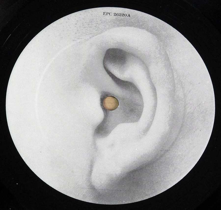 Close up of Side One record's label STRANGLERS - Aural Sculpture 12" LP Vinyl Album

