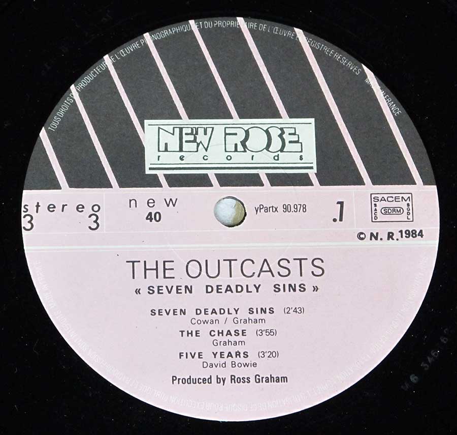 Close up of Side One record's label OUTCASTS - Seven Deadly Sins 12" LP Vinyl Album