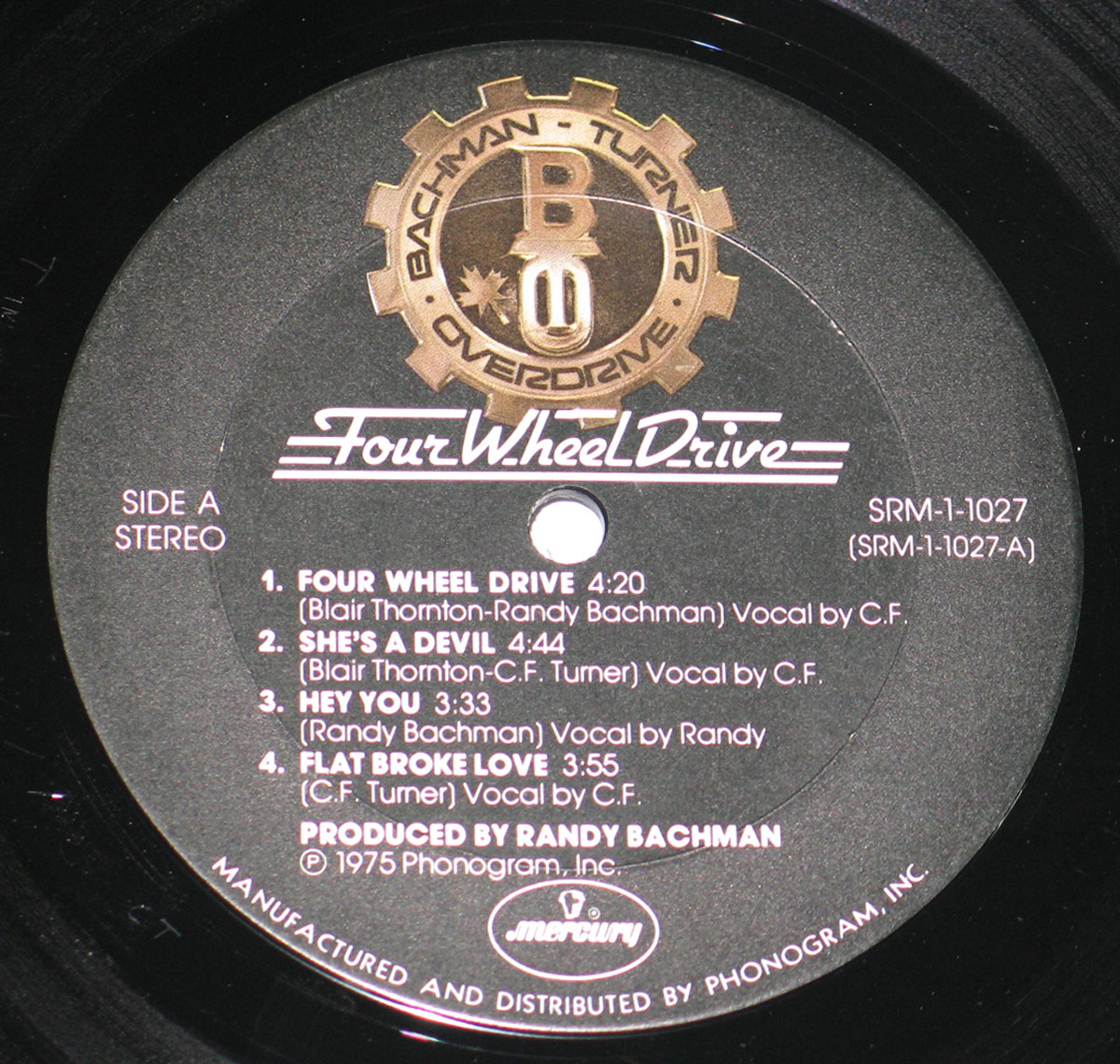 Close-up of BTO Four Wheel Drive Side A record label showing track list, gear logo, and Mercury branding