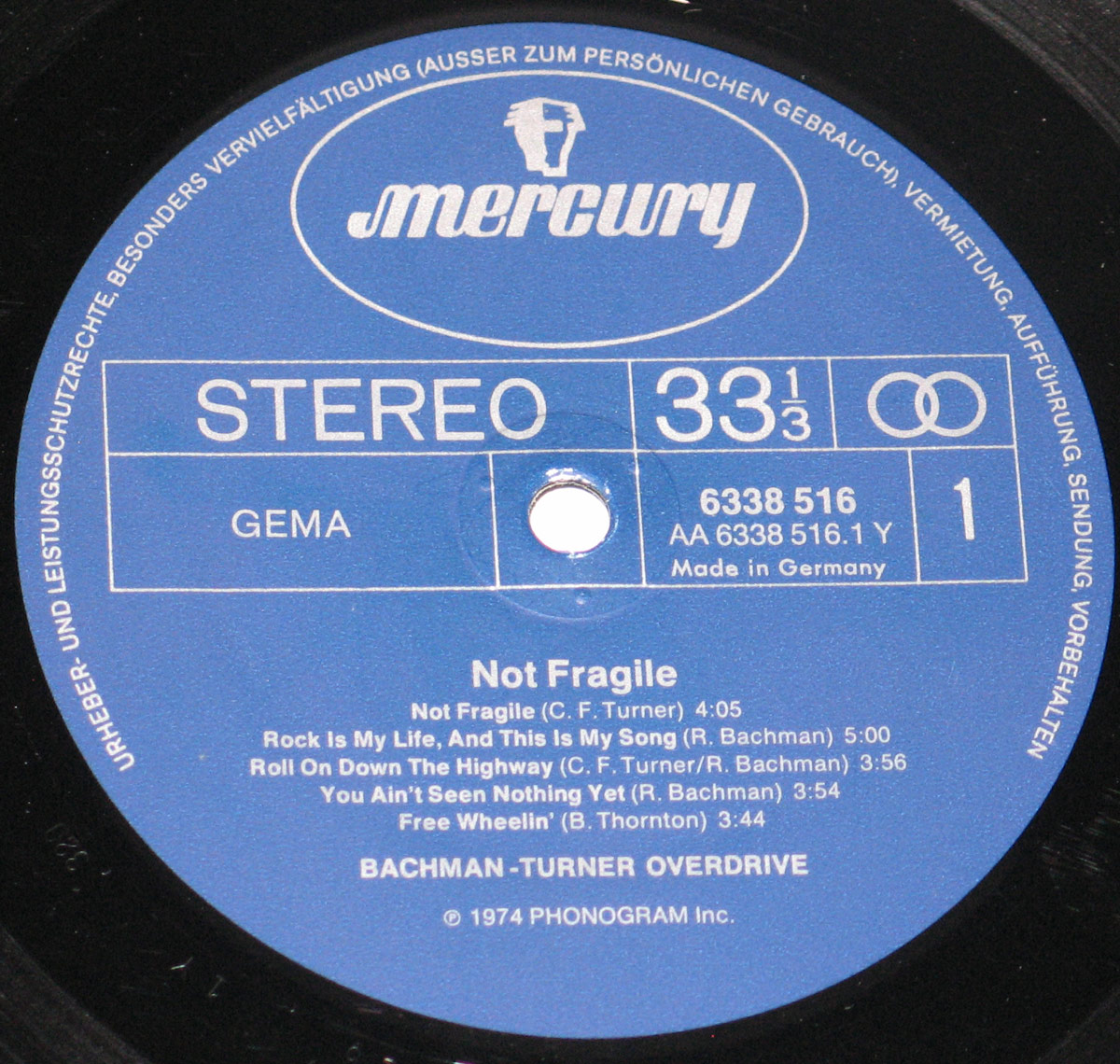 Close-up of blue Mercury label on Side One of Bachman Turner Overdrive's Not Fragile LP, showing tracklist, catalog number 6338 516, and GEMA mark